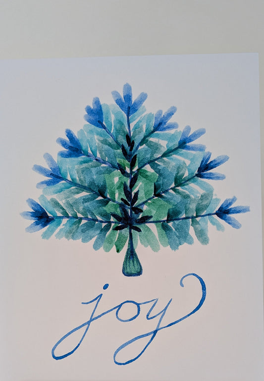 Watercolor painting of a blue and green tree with 'joy' written below on a white background.