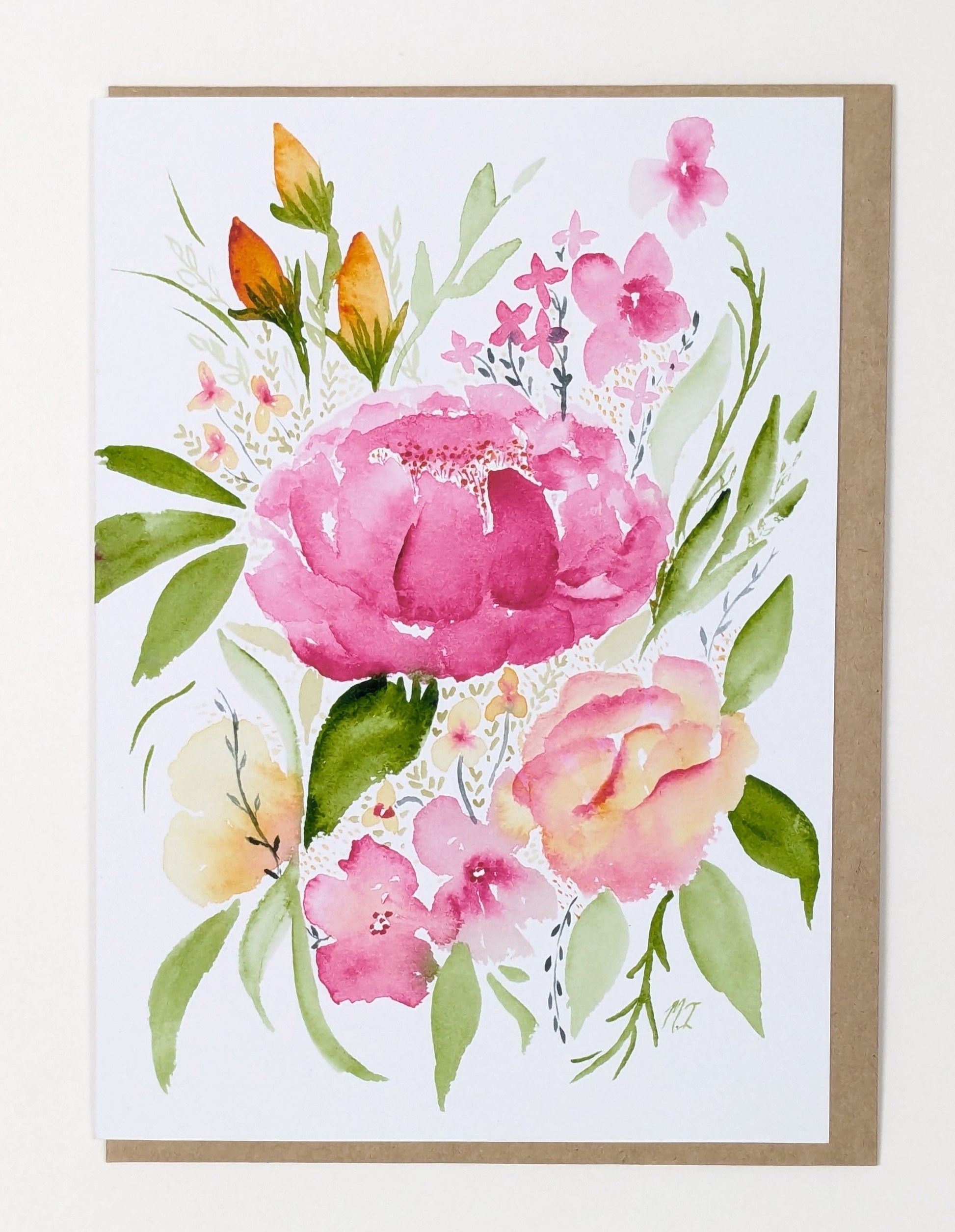 Floral greeting card with pink and yellow flowers, green leaves on a white background. with brown envelope